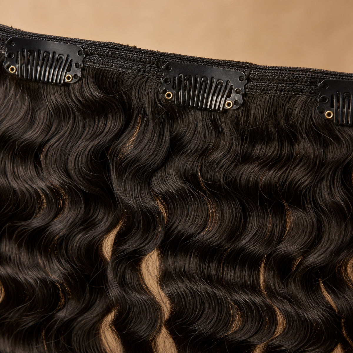 A clip-in extension set detail on a salon station.