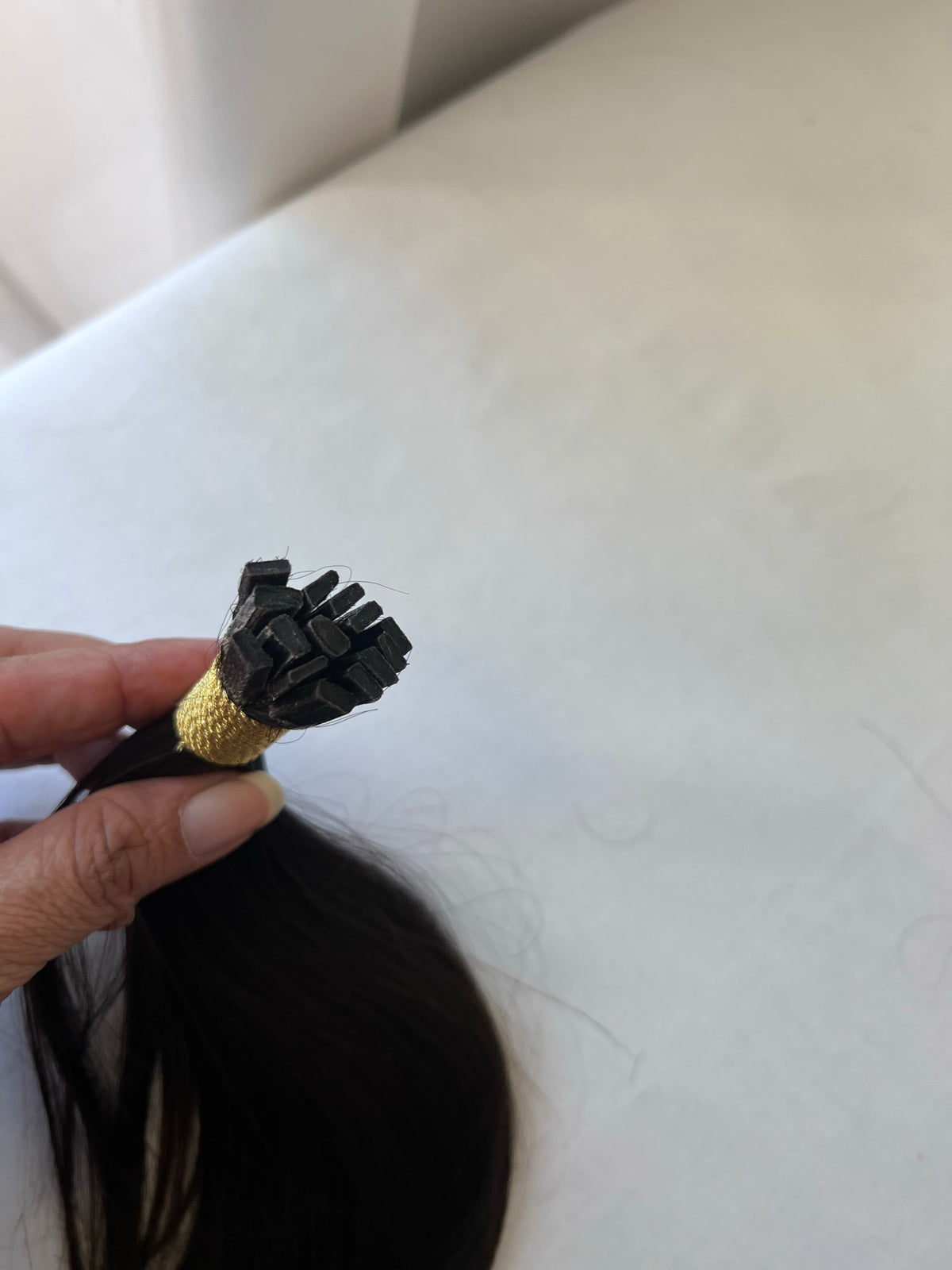 Bonded tip detail of raw 1B human hair tester