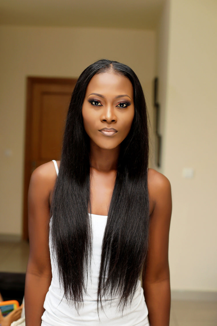 Silky straight Indian Remy hair extensions worn by a model